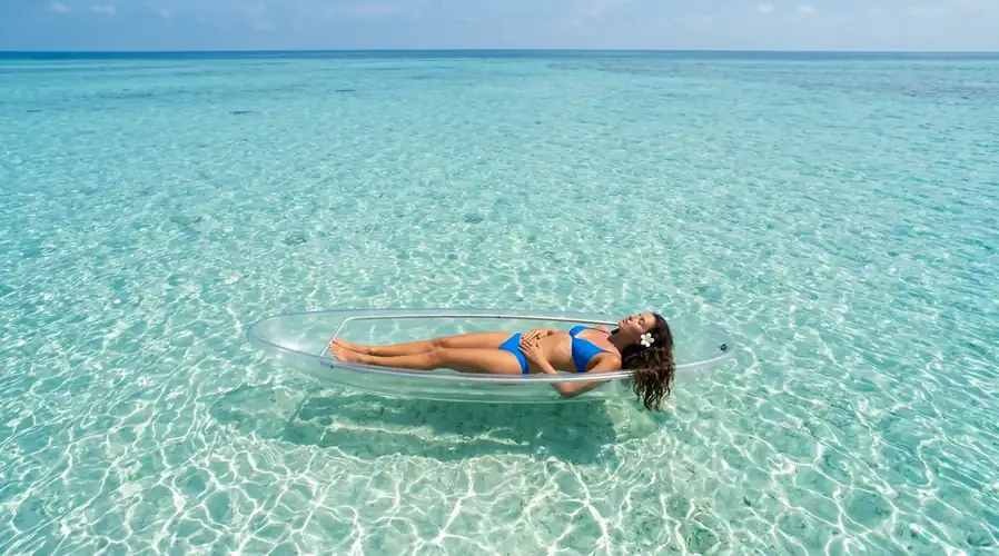 Recreational kayaking activity in the turquoise sea Sisipan Island Resort