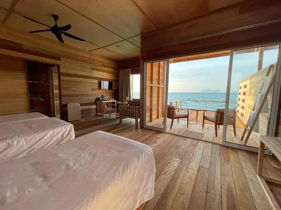 Open-air triple room Sisipan Island Resort