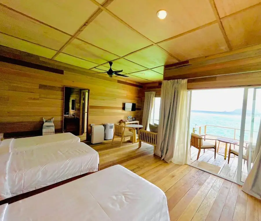 Triple room balcony view Sisipan Island Resort
